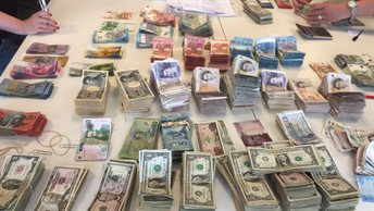 In beslag genomen geld. Foto: Openbaar Ministerie In beslag genomen geld